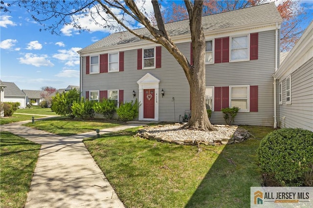 532 Old Nassau Rd Unit 532N, Monroe, NJ 08831 - colonial-style house featuring a front lawn and roof with shingles