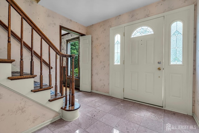 21 Shadyside Ct, Branchburg, NJ 08876 - entryway featuring wallpapered walls, healthy amount of natural light, and stairway