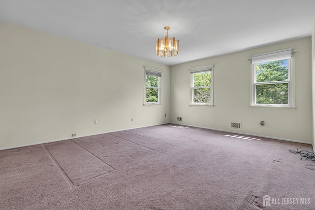 21 Shadyside Ct, Branchburg, NJ 08876 - unfurnished room featuring a chandelier and carpet flooring