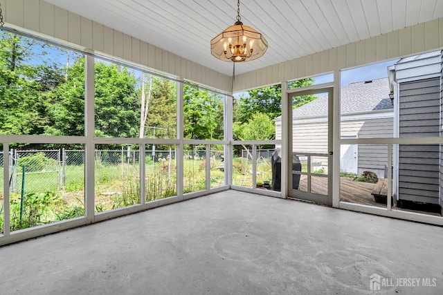 21 Shadyside Ct, Branchburg, NJ 08876 - unfurnished sunroom with a chandelier and view of scattered trees