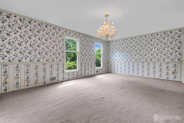 21 Shadyside Ct, Branchburg, NJ 08876 - spare room with wallpapered walls, crown molding, a chandelier, and carpet flooring
