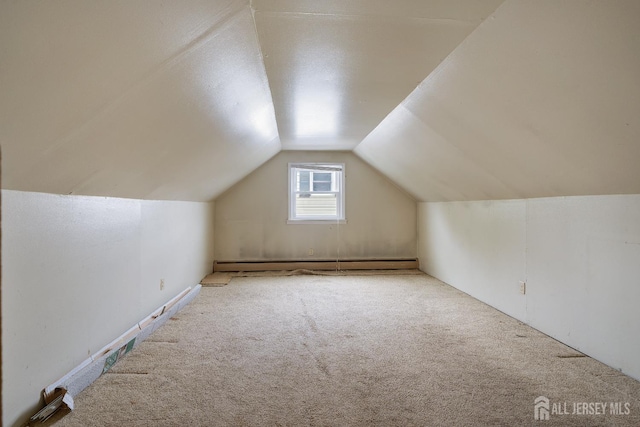 58 Hudson St, Menlo Park Terrace, NJ 08840 - bonus room featuring a baseboard heating unit, carpet flooring, and vaulted ceiling