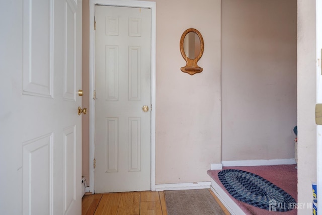 58 Hudson St, Menlo Park Terrace, NJ 08840 - corridor with light wood-style flooring and baseboards