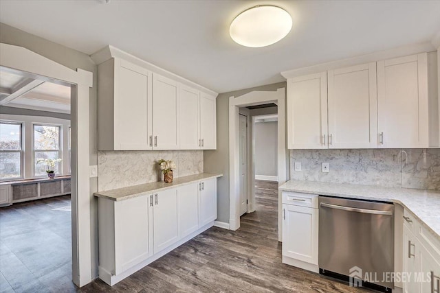 kitchen featuring dark wood-type flooring, white cabinets, stainless steel dishwasher, tasteful backsplash, and radiator heating unit