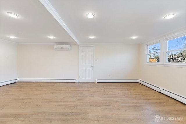 interior space featuring wood finished floors, a baseboard heating unit, a wall mounted AC, and ornamental molding