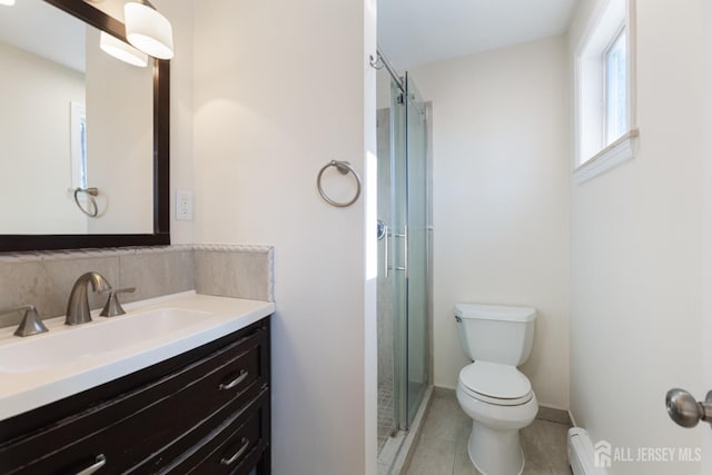 full bath with tasteful backsplash, a baseboard heating unit, toilet, a stall shower, and vanity