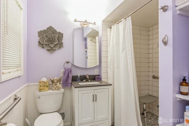 4 Wedgewood Ct, East Brunswick, NJ 08816 - full bathroom featuring vanity, toilet, tiled shower, and a wainscoted wall