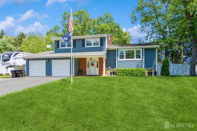 4 Wedgewood Ct, East Brunswick, NJ 08816 - tri-level home with driveway, a chimney, and a garage