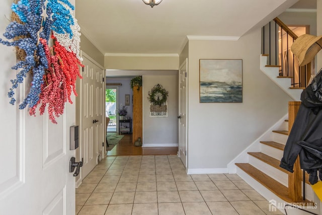 4 Wedgewood Ct, East Brunswick, NJ 08816 - foyer entrance with stairway, ornamental molding, light tile patterned floors, and baseboards