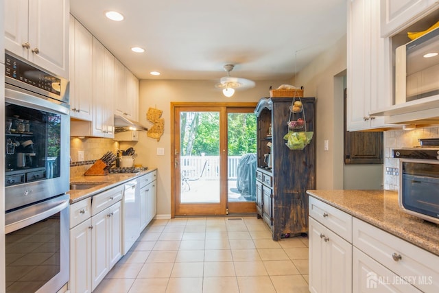 4 Wedgewood Ct, East Brunswick, NJ 08816 - kitchen with double oven, dishwasher, white cabinets, decorative backsplash, and recessed lighting