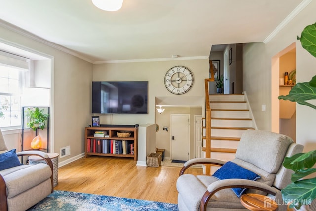 4 Wedgewood Ct, East Brunswick, NJ 08816 - living area featuring wood finished floors, stairs, crown molding, and baseboards