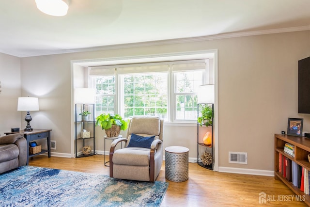 4 Wedgewood Ct, East Brunswick, NJ 08816 - living area featuring wood finished floors, ornamental molding, and baseboards
