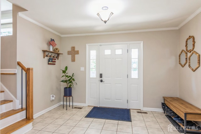 4 Wedgewood Ct, East Brunswick, NJ 08816 - entrance foyer featuring light tile patterned floors, ornamental molding, stairs, and baseboards