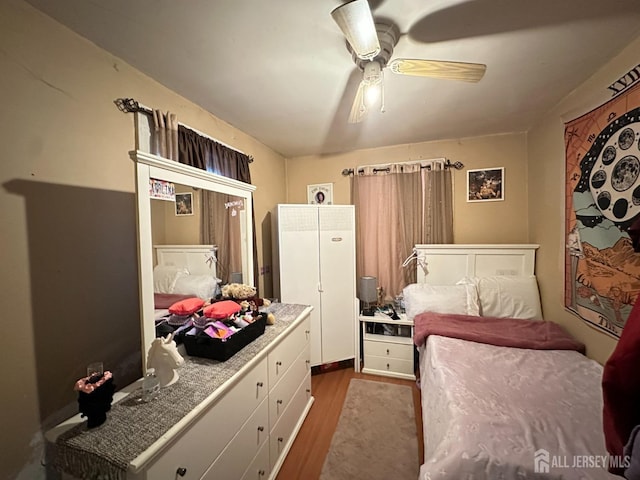 7 Hazelhurst St, New Brunswick, NJ 08901 - bedroom with dark wood-style floors and ceiling fan