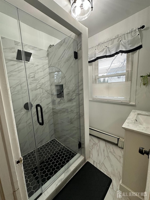 7 Hazelhurst St, New Brunswick, NJ 08901 - full bathroom featuring a baseboard radiator, marble look tile flooring, a stall shower, and vanity