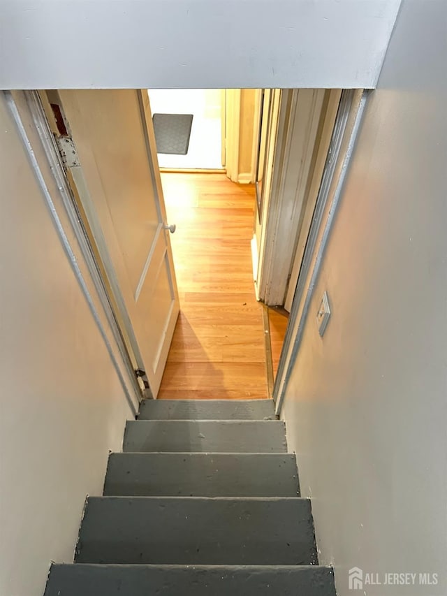 7 Hazelhurst St, New Brunswick, NJ 08901 - stairs featuring wood finished floors