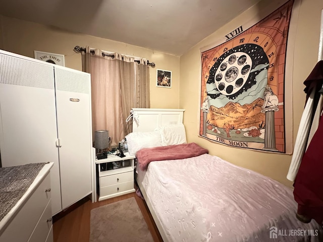 7 Hazelhurst St, New Brunswick, NJ 08901 - bedroom featuring dark wood-style floors