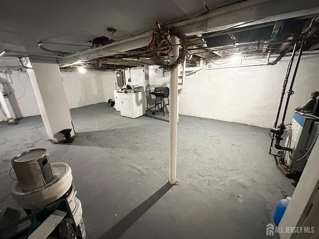 7 Hazelhurst St, New Brunswick, NJ 08901 - unfinished below grade area with electric panel and washer / clothes dryer