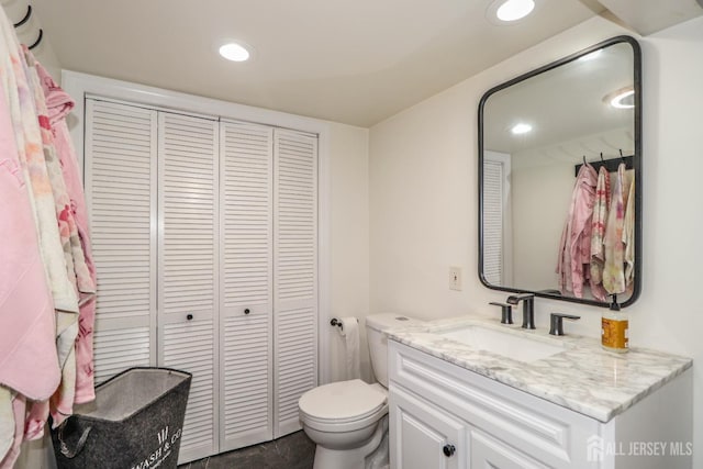 23 Elm Ave, Metuchen, NJ 08840 - bathroom featuring a closet, vanity, and recessed lighting