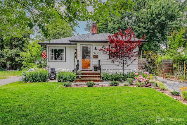 23 Elm Ave, Metuchen, NJ 08840 - view of front of home featuring a chimney
