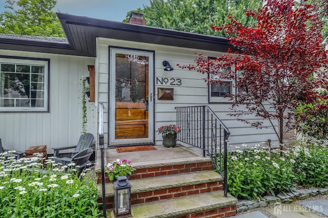23 Elm Ave, Metuchen, NJ 08840 - entrance to property with a chimney