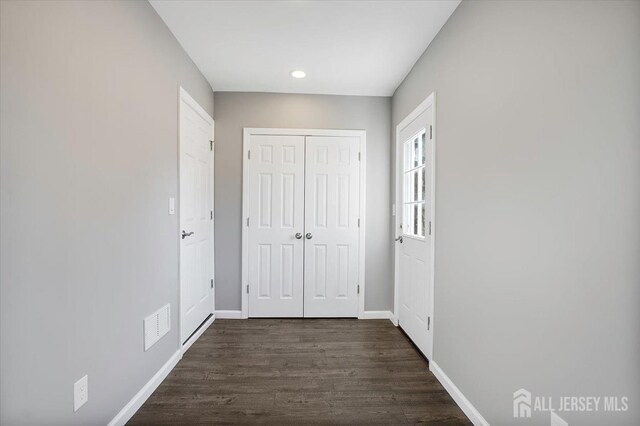 15 Douglas St, Sayreville, NJ 08872 - corridor featuring dark wood-type flooring, baseboards, and recessed lighting