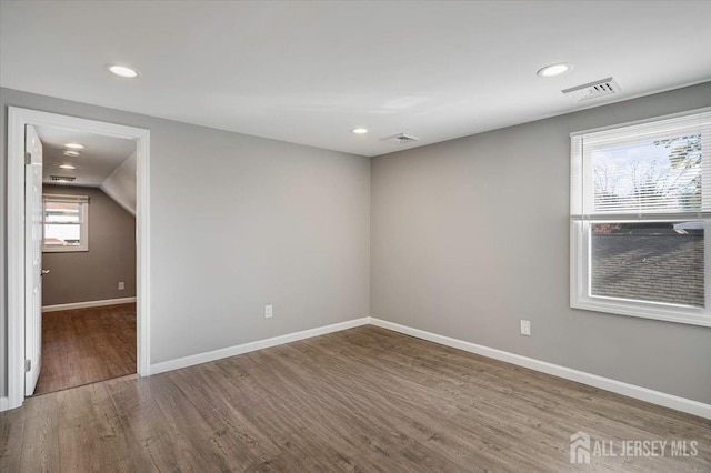 15 Douglas St, Sayreville, NJ 08872 - empty room featuring wood finished floors, baseboards, and recessed lighting