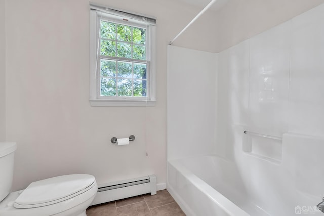 bathroom with shower / washtub combination, tile patterned flooring, toilet, and baseboard heating