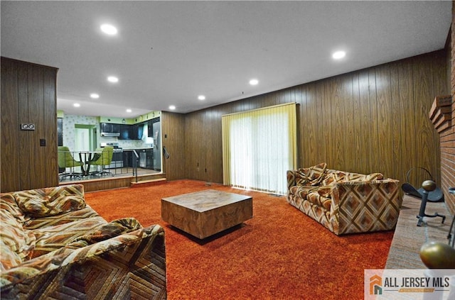 20 Rath Ln, East Brunswick, NJ 08816 - living room featuring carpet, recessed lighting, and wood walls