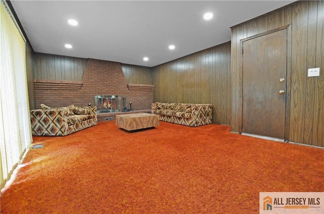 20 Rath Ln, East Brunswick, NJ 08816 - sitting room featuring carpet, a fireplace, recessed lighting, and wooden walls