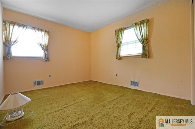 20 Rath Ln, East Brunswick, NJ 08816 - spare room featuring carpet floors and baseboards
