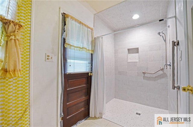 20 Rath Ln, East Brunswick, NJ 08816 - bathroom with tiled shower, tile patterned floors, and recessed lighting