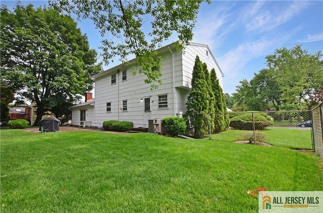 20 Rath Ln, East Brunswick, NJ 08816 - view of side of home with a central air condition unit