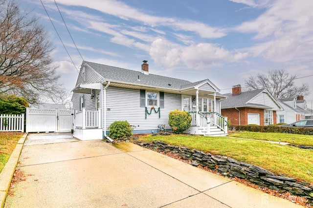 view of front of home with a front yard