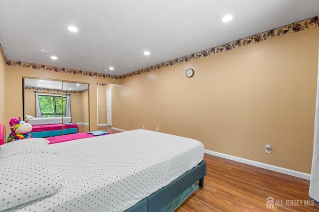 12 Arbor Ct, South Brunswick, NJ 08852 - bedroom with wood finished floors and recessed lighting