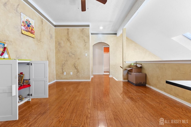 12 Arbor Ct, South Brunswick, NJ 08852 - spare room with arched walkways, ceiling fan, and wood finished floors