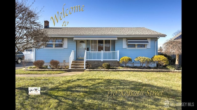 ranch-style house with a porch and a front yard