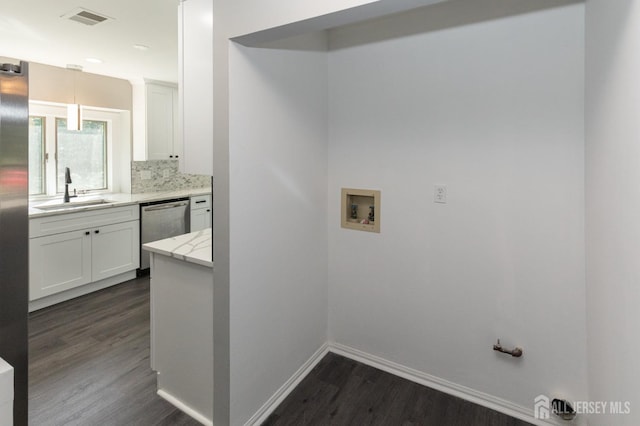 15 Pennyroyal Ct, South Brunswick, NJ 08540 - laundry room with washer hookup, dark wood-style floors, and baseboards