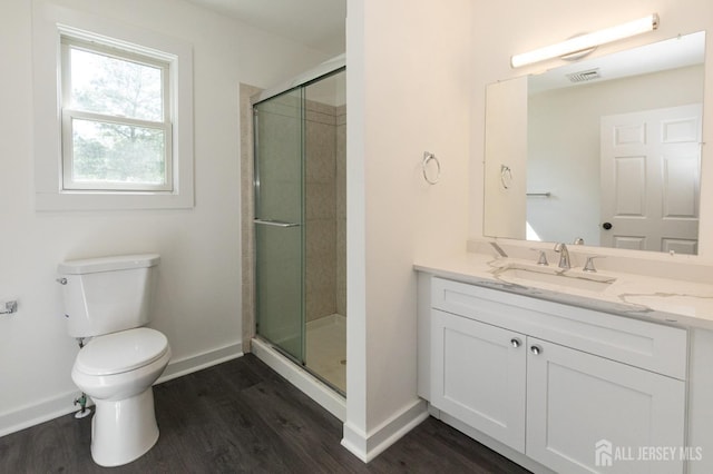 15 Pennyroyal Ct, South Brunswick, NJ 08540 - bathroom with wood finished floors, toilet, vanity, baseboards, and a shower stall