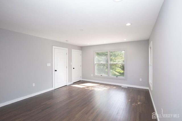 15 Pennyroyal Ct, South Brunswick, NJ 08540 - unfurnished room with baseboards, dark wood-style flooring, and recessed lighting