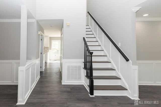 15 Pennyroyal Ct, South Brunswick, NJ 08540 - stairway featuring a decorative wall, crown molding, wainscoting, and wood finished floors