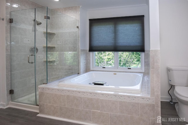 15 Pennyroyal Ct, South Brunswick, NJ 08540 - bathroom featuring toilet, a garden tub, wood finished floors, a stall shower, and ornamental molding