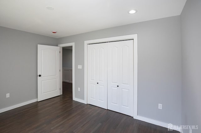 15 Pennyroyal Ct, South Brunswick, NJ 08540 - unfurnished bedroom with baseboards, dark wood-style floors, a closet, and recessed lighting