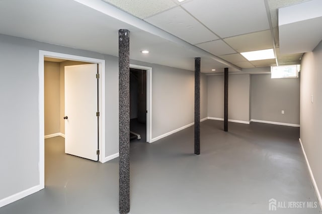 15 Pennyroyal Ct, South Brunswick, NJ 08540 - basement with baseboards, a paneled ceiling, and recessed lighting