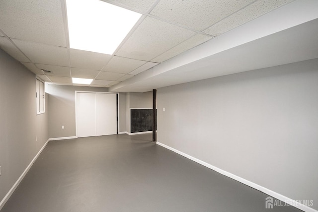 15 Pennyroyal Ct, South Brunswick, NJ 08540 - finished basement featuring baseboards and a paneled ceiling