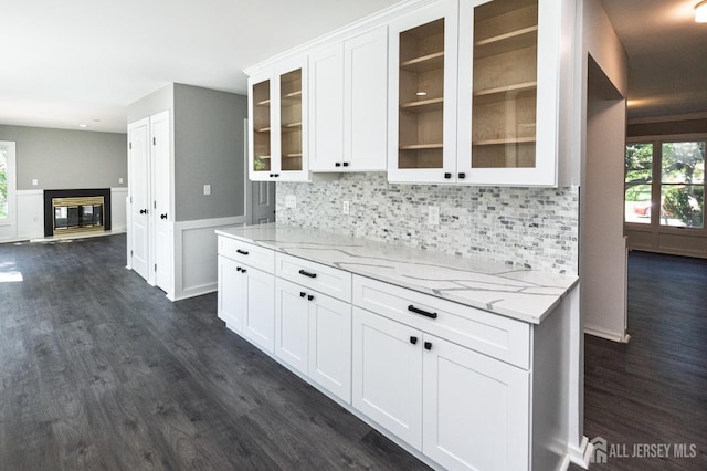 15 Pennyroyal Ct, South Brunswick, NJ 08540 - kitchen featuring dark wood-style floors, tasteful backsplash, light stone counters, white cabinets, and recessed lighting