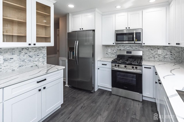 15 Pennyroyal Ct, South Brunswick, NJ 08540 - kitchen featuring appliances with stainless steel finishes, tasteful backsplash, white cabinets, glass insert cabinets, and recessed lighting