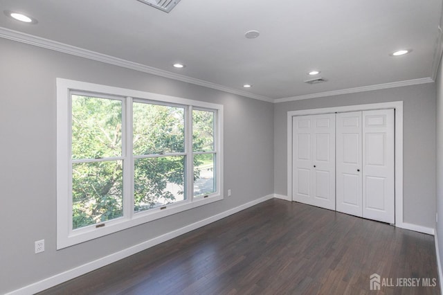 15 Pennyroyal Ct, South Brunswick, NJ 08540 - unfurnished bedroom featuring baseboards, dark wood-style flooring, recessed lighting, ornamental molding, and a closet
