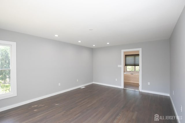 15 Pennyroyal Ct, South Brunswick, NJ 08540 - spare room with plenty of natural light, baseboards, dark wood-style flooring, and recessed lighting