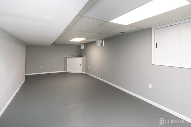 15 Pennyroyal Ct, South Brunswick, NJ 08540 - finished basement featuring baseboards and a drop ceiling